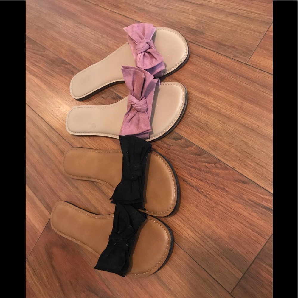 Two pair of bow tie flip flops
